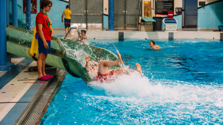 person going down water slide